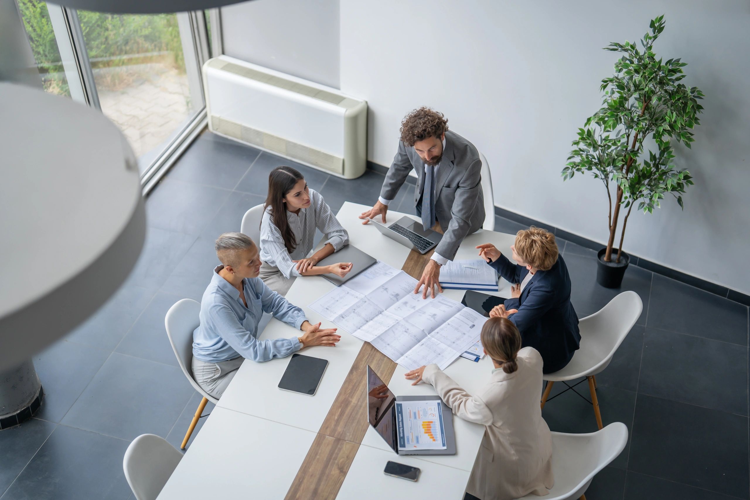 Property services team collaborating in a meeting
